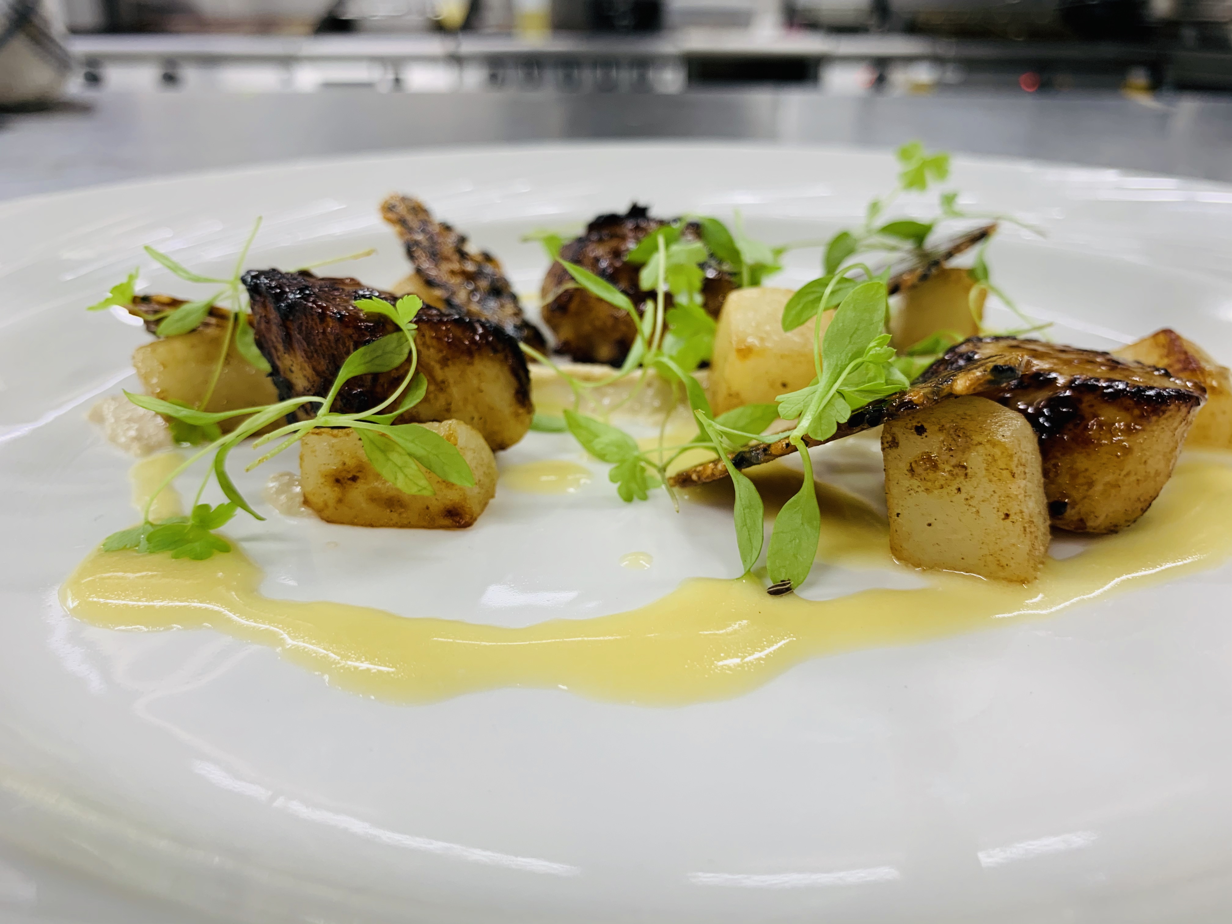 Seared scallops, miso glaze, sesame puree & verjus cream