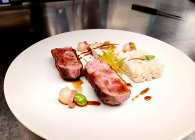Honey and Szechuan Pepper Glaze Duck Breast With Sticky Coconut Rice, Broad Beans, and Stem Ginger