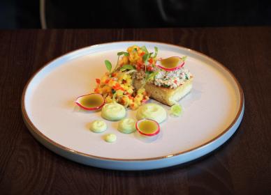 Crab on toasted brioche with mango salsa, avocado cream and fresh coriander