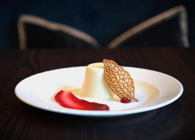 Lemon and elderflower panna cotta raspberry tuile and raspberry gel
