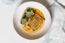Saffron poached hake, chorizo and braised peas with wild mushrooms