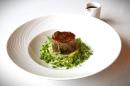 Slow braised lamb Henry served with olive oil crushed potatoes, leek and pea fricasse and a mint jus