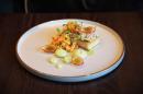 Crab on toasted brioche with mango salsa, avocado cream and fresh coriander