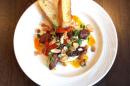 Chorizo and hummus, crispy chickpeas, roasted peppers, and toasted almonds, with toasted sourdough