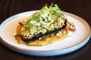 Stuffed eggplant with baba ghanoush purée, pearl couscous, feta and coriander oil