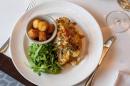 Cauliflower steak served with potato rosti and tomato salsa