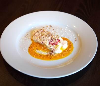Coconut and mango frozen parfait, with a mango puree